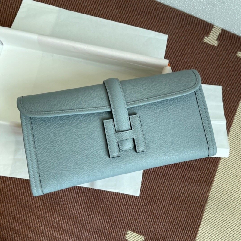 H**mes clutch bags